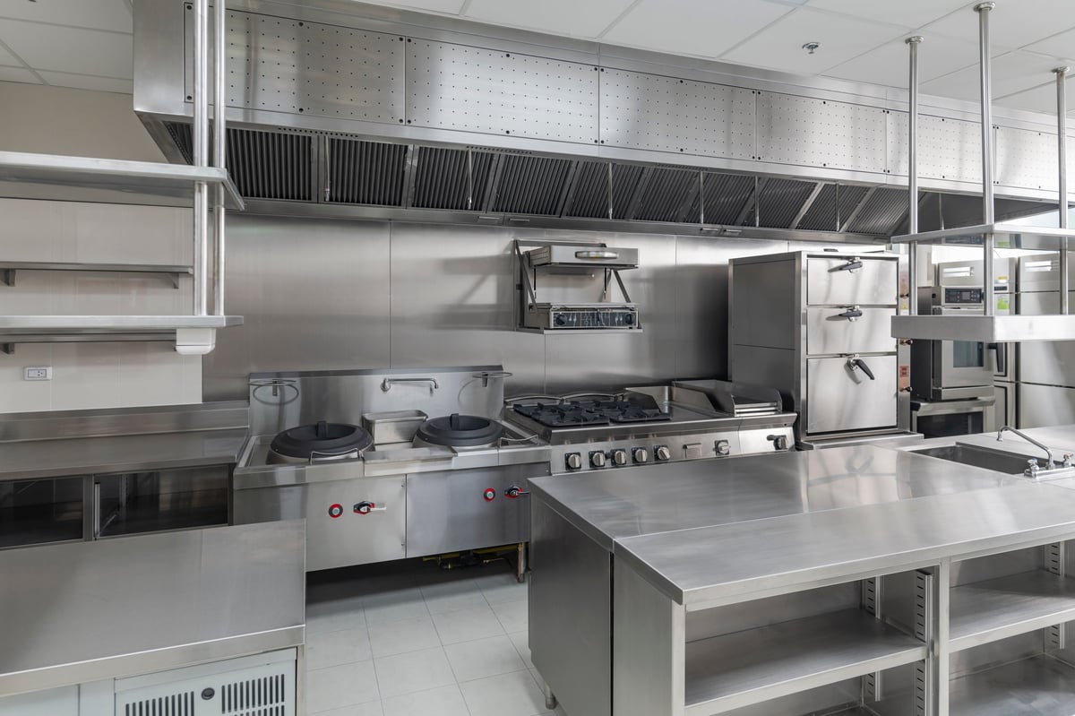 Modern industrial kitchen with professional cooking equipment